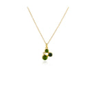 Three blue/green tourmalines, approximately 1.75 cttw, and a round diamond, .025 cts, in a "confetti" cluster with 18k yellow gold and 14k yellow gold behind stones. Pendant is on a 18'' long, 18k yellow gold chain and ranges from 5/8" -3/4" x 3/8" (16-19 x 10 mm) in size.