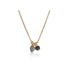 18k yellow gold necklace with a natural rough diamond sphere, 3.65 cts, and a rose-cut black diamond, 0.80 cts, on an 18k yellow gold 16" long chain.