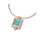 24k yellow gold and sterling silver step bezel pendant with rectangular Australian Bolder opal, 3.33 cts, and a round diamond, 0.24ct. Pendant is on a woven sterling silver chain.