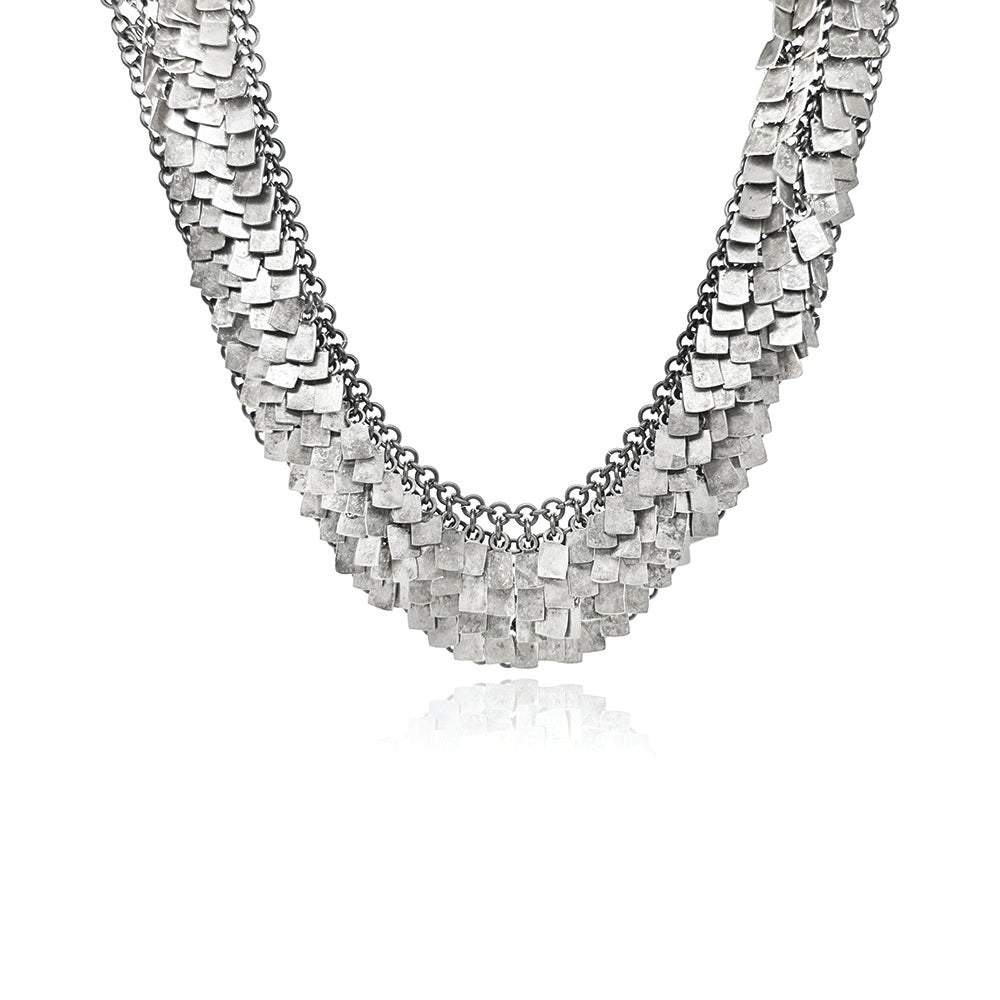 Sterling silver and titanium chainmaille shake necklace with toggle clasp. Necklace is 15" long x 1" wide. 