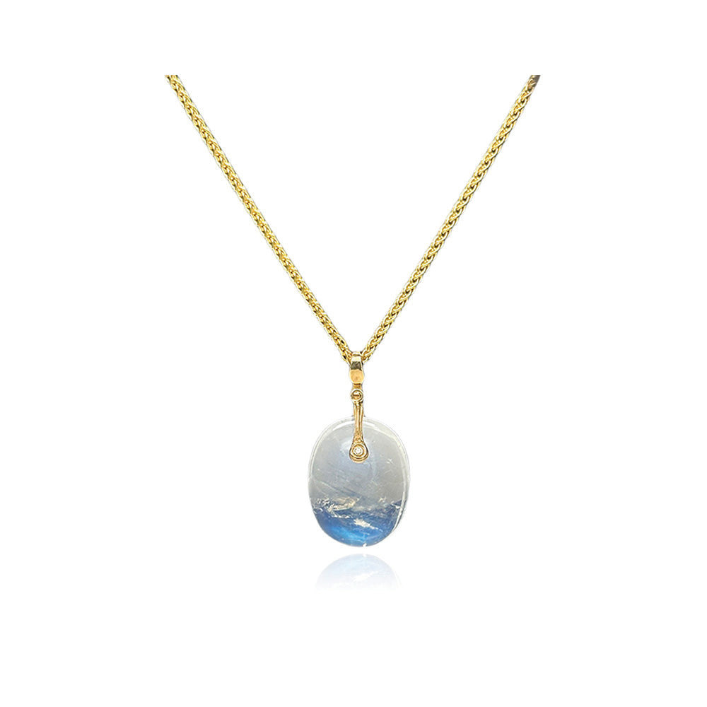 large oval moonstone pendant with diamond