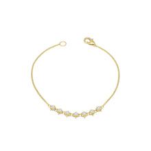 Petite Textile freshwater pearl bracelet, approximately 0.65 cttw, chain is 18k yellow gold and is ___" long.
