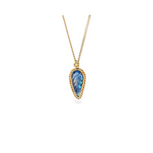 One-of-a-kind carved leaf moonstone necklace, .85 ct, bezel set in 18k yellow gold with 18k woven chain surround. Moonstone is 3/4" tall x 7/16" (20 x 11mm) on an 18k yellow gold adjustable chain (16"-18") with lobster clasp.