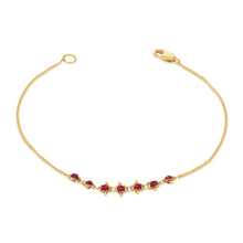 "Petite Textile" ruby bracelet with approximately 1 cttw of rubies, in 18k yellow gold with lobster clasp. Bracelet is 7" long x 3/16" wide (4mm).