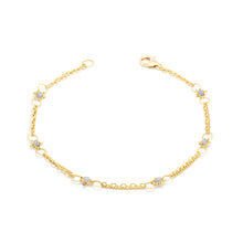 "Whisper Chain" silver diamond bracelet with approximately .60 cttw, in 18k yellow gold with a lobster clasp. Bracelet is 7" long x 3/16" wide (4mm).