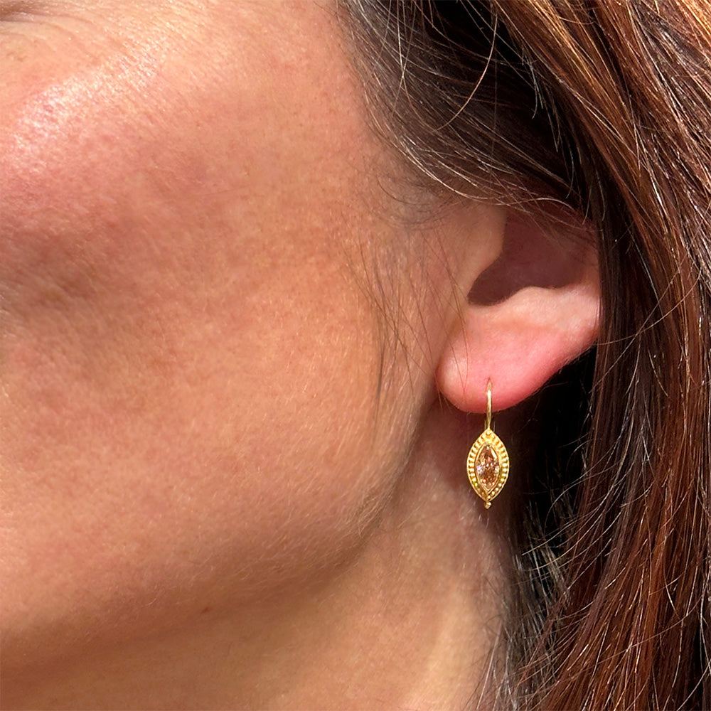 marquis-shaped champagne colored diamond earrings