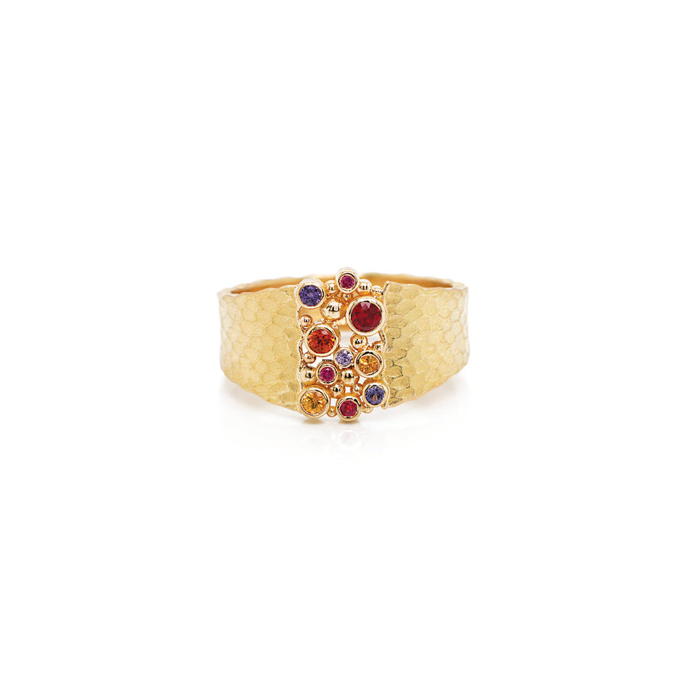 18k yellow gold glacier ring with sapphires, 0.29 cttw, and two rubies. Ring is a size 7.5 and is 1/2" wide (12mm).