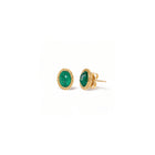emerald stud earrings with woven chain surround