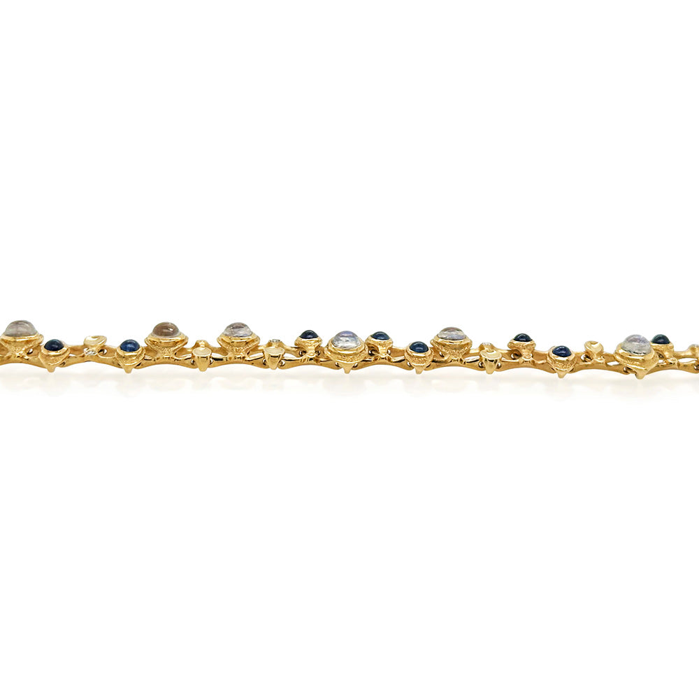 hinged moonstone and sapphire "Music Notes" bracelet