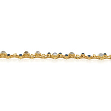 hinged moonstone and sapphire "Music Notes" bracelet