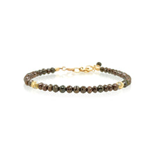 Chocolate diamond faceted bead bracelet, approximately 20 cttw, with 18k yellow gold owl spacer beads with VS White diamonds. Bracelet is 7" long with a 1 3/4" extension chain and lobster clasp. Diamonds are graduated 4mm-4.5mm.
