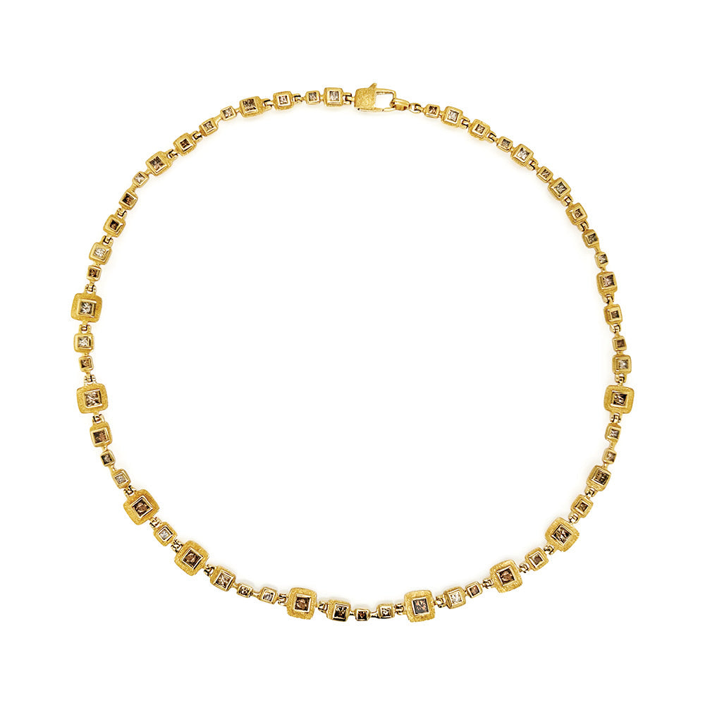 18k yellow "Library Collection" hinged necklace with princess cut brown diamonds. Necklace is 17" long and links are 8x8mm with a square lobster clasp.