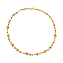 18k yellow "Library Collection" hinged necklace with princess cut brown diamonds. Necklace is 17" long and links are 8x8mm with a square lobster clasp.