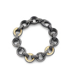 swirl pattern bracelet with 3 gold links