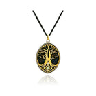 Oxidized sterling silver and 18k yellow gold "Tree of Life" pendant with one pear shaped natural colored chocolate diamond, 0.05cts, on a oxidized sterling silver chain. Chain is 16" long with a lobster clasp and pendant is 40mm long x 19mm wide.