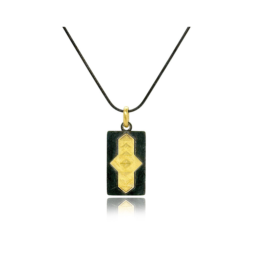 Oxidized sterling silver and 18k yellow gold "Arrow" tag pendant on an oxidized sterling silver chain. Chain is 18" long with a lobster clasp and arrow is 1 1/2" L x 5/8" W (38 x 15mm).