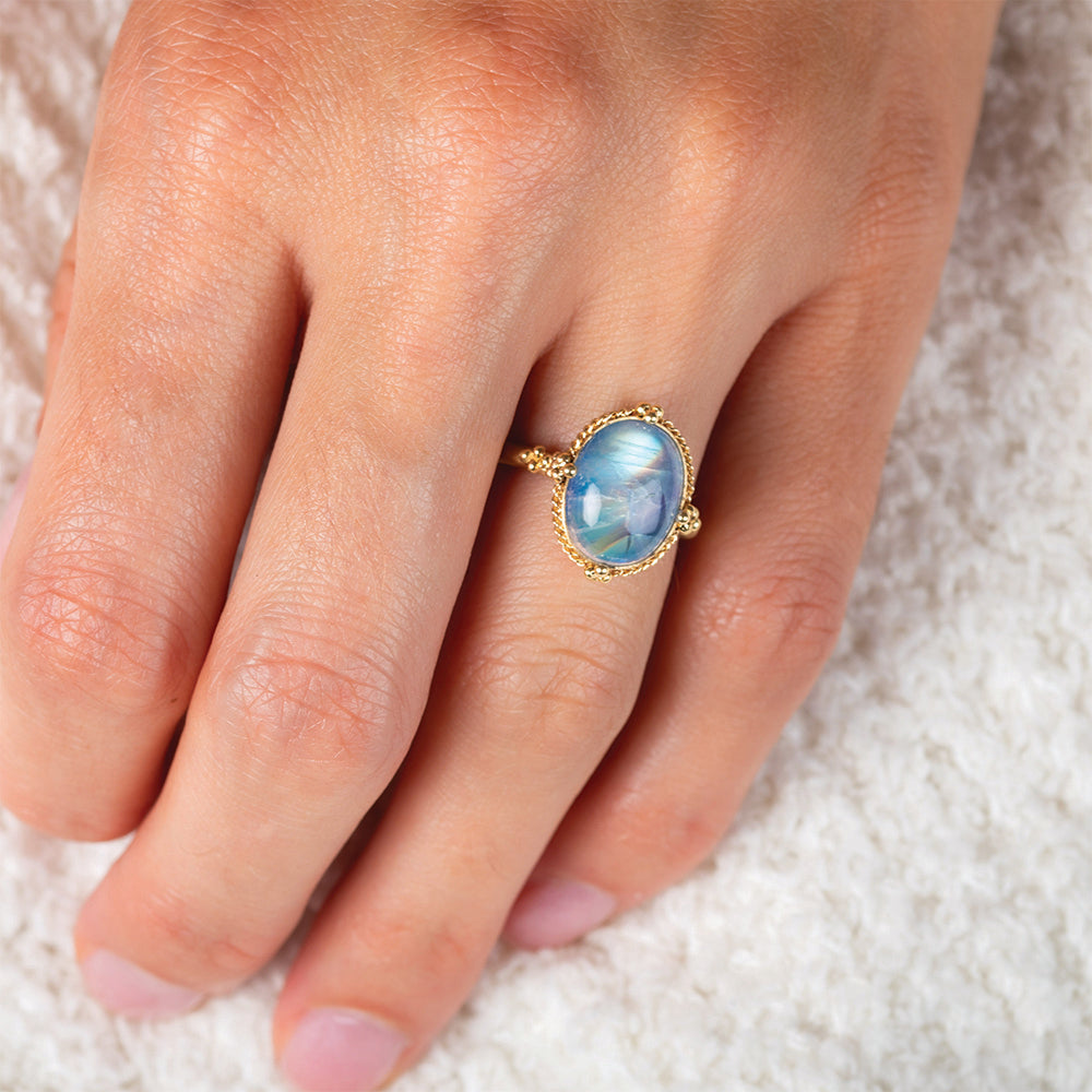 oval moonstone ring, blue flash with rainbow striations