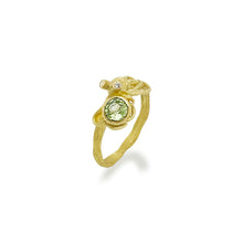 octopus ring with green sapphire