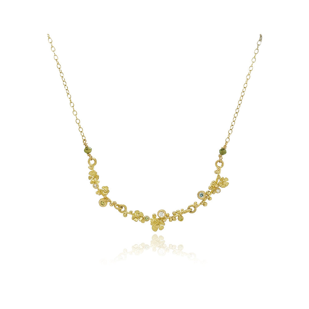 Hand-formed 18k yellow gold "Bar" flower necklace with articulated sections, colored and faceted diamonds, 0.18cttw.. Necklace is 19" long with a lobster clasp and bar is 65mm long (2 5/8").