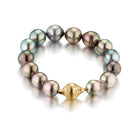 Black Tahitian pearl stretch bracelet with 18k gold crownwork finial