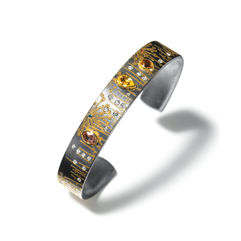 Narrow Dandelion cuff with sapphires, colored and white diamons