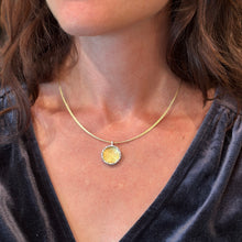 Shield pendant in 18k with Platinum rim and diamonds