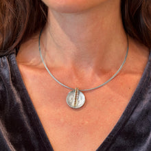sun dial pendant in platinum and 18k with diamonds
