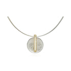 Sun dial pendant in platinum and 18k gold