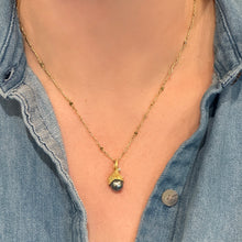 Grey Tahitian pearl pendant with hand-fabricated acorn top and bail with white diamond, 0.01ct. Pendant is 7/8" L x 3/8" diameter. ***CHAIN SOLD SEPARATELY***