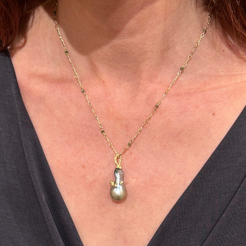 Elongated Tahitian Pearl Pendant with Snail