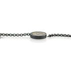 Round Vario clasp in oxidized sterling silver and 12k white gold, with white (G) diamonds, vsi, 0.18 cttw. Clasp is 27mm (1 1/8") diameter and 6mm high.