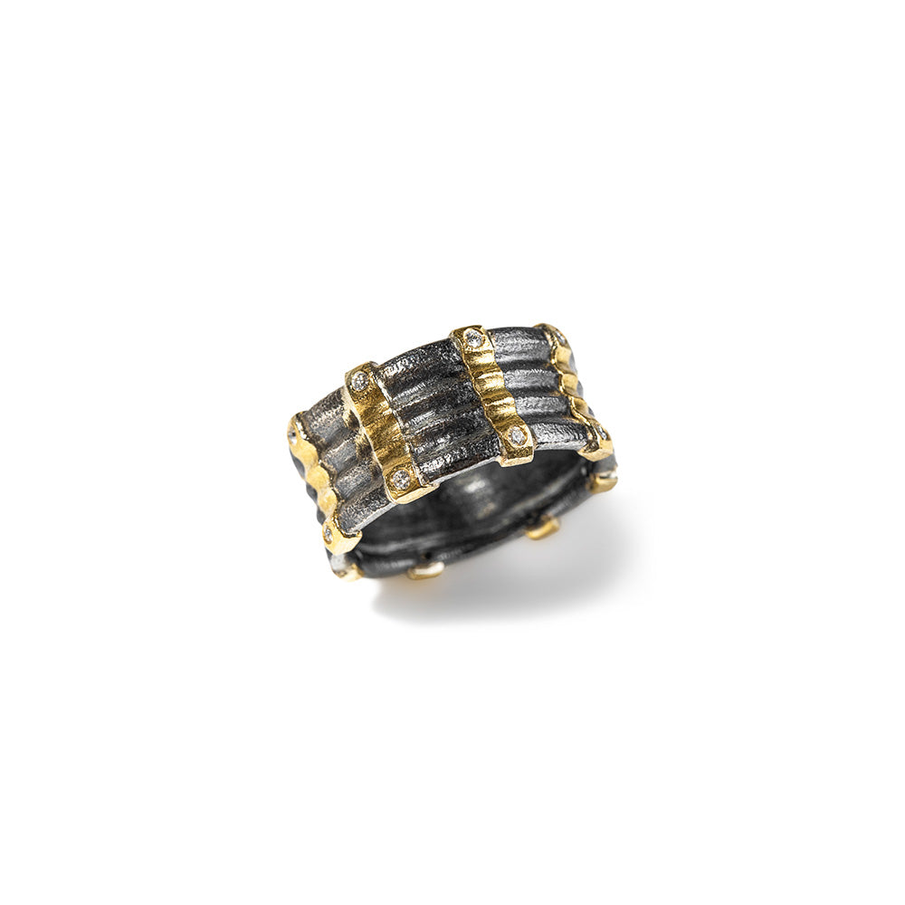 Layered oxidized sterling silver ring with 22k yellow gold vertical stripes and white (G) diamonds, 0.16 cttw. Ring is 7/16" wide and is a size 9.