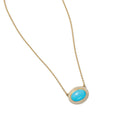 Aurora pendant with an East/West set oval turquoise cabochon surrounded by pavé-set diamonds, 0.35 cttw, with a high polish. Chain is 18k yellow gold with a lobster clasp and is adjustable to 19" long. The pendant is 5/8" x 3/4" (16 x 19mm)