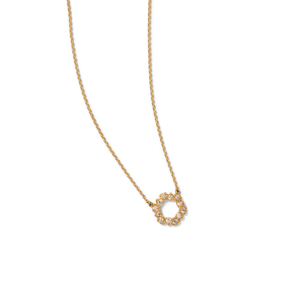18k yellow gold circular pendant with 12 vs diamonds, 0.38 cttw, Pavé-set in adjoining trillion settings on a 17" long chain. Pendant is 5/8" in diameter (16mm).