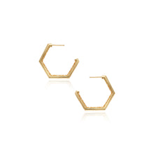 Eclipse hoop earrings in 18k yellow gold with pavé-set diamonds, 0.56 cttw, on the face of the earrings with post backs. Earrings are 1 3/8" diameter (35mm) x 1/8" wide (3mm).