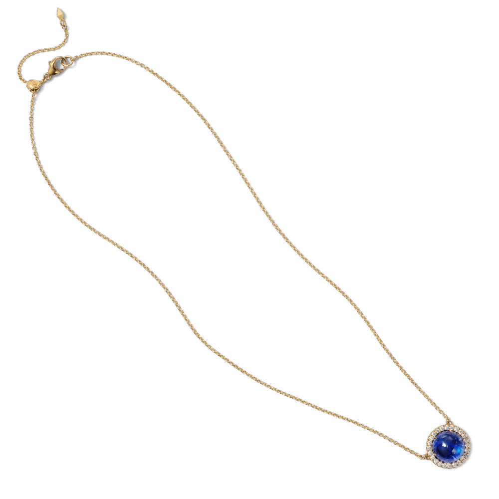 Luna Tanzanite Pendant with Diamond Surround
