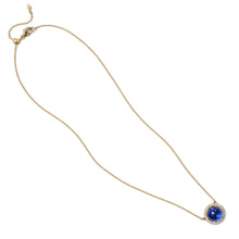 Luna Tanzanite Pendant with Diamond Surround