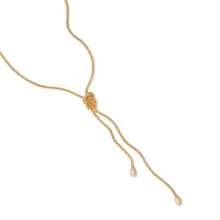Cabo chain lariat necklace with pavé-set diamonds, 1.44 cttw, and white moonstone in 18k yellow gold. Lariat is 44" long x 3/16" D (4mm) and moonstone is 7mm.
