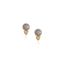Ellis stud earrings in 18k yellow gold with a round grey moonstone and trillion shaped pavé-set diamond accent, 0.12 cttw. Moon stone is 8mm and earrings are 9/16" long x 3/8" wide (14 x 10mm).