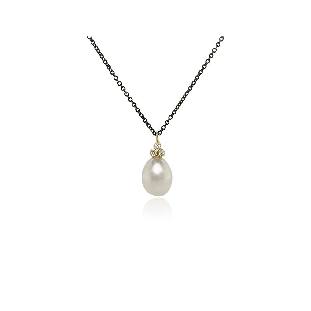 pearl pendant with triple diamonds