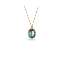 Rainbow flash moonstone pendant with feather inclusion