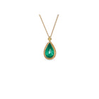 tear drop emerald pendant with woven chain surround and granulation on bail