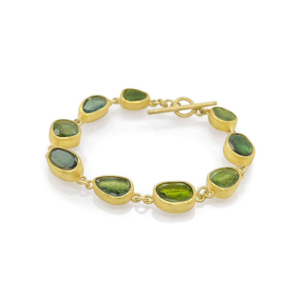 free form faceted green tourmaline bracelet