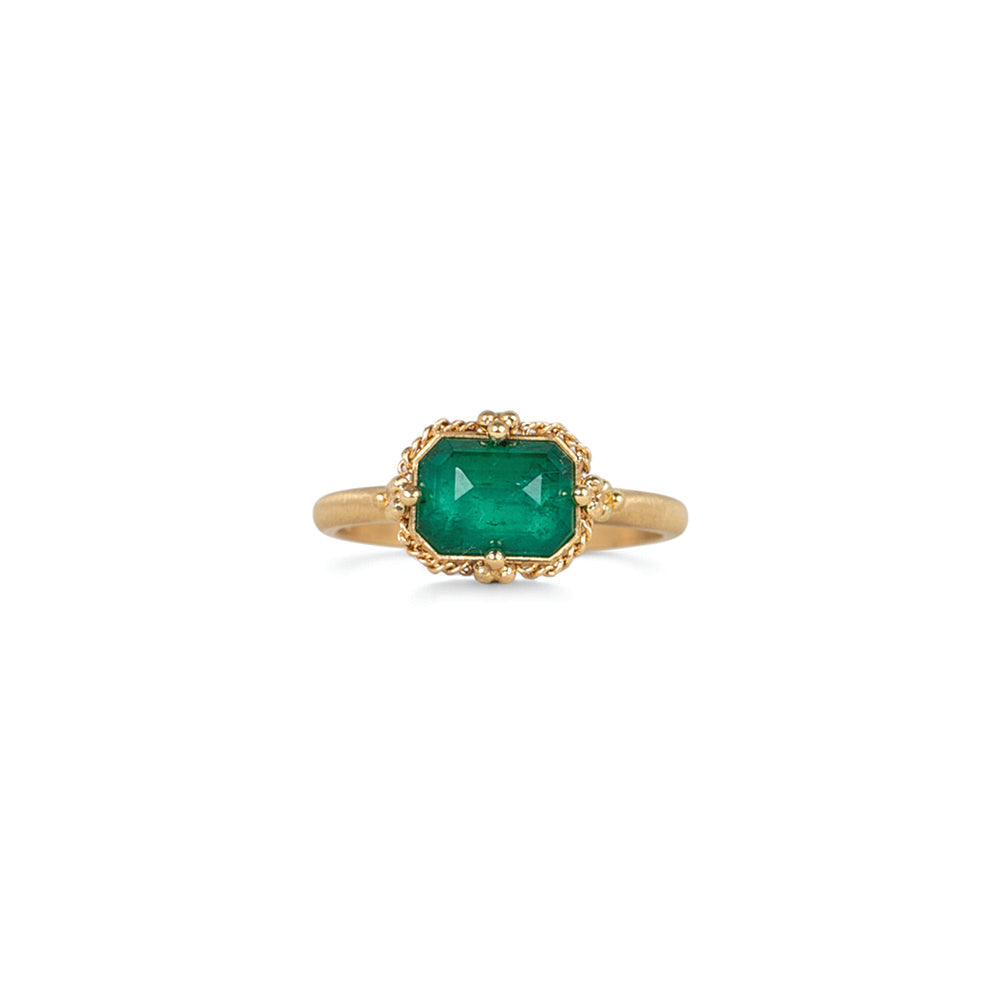 One of a kind East/West emerald ring