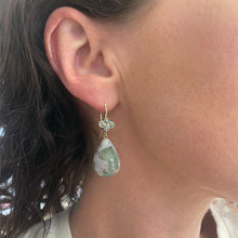 18k yellow gold 4-stone clover top crownwork earrings with bezel-set green sapphires and aquaprase pear-shaped drops on French wires. Earrings are 1 5/8" long x 5/8" diameter (41 x 16mm).