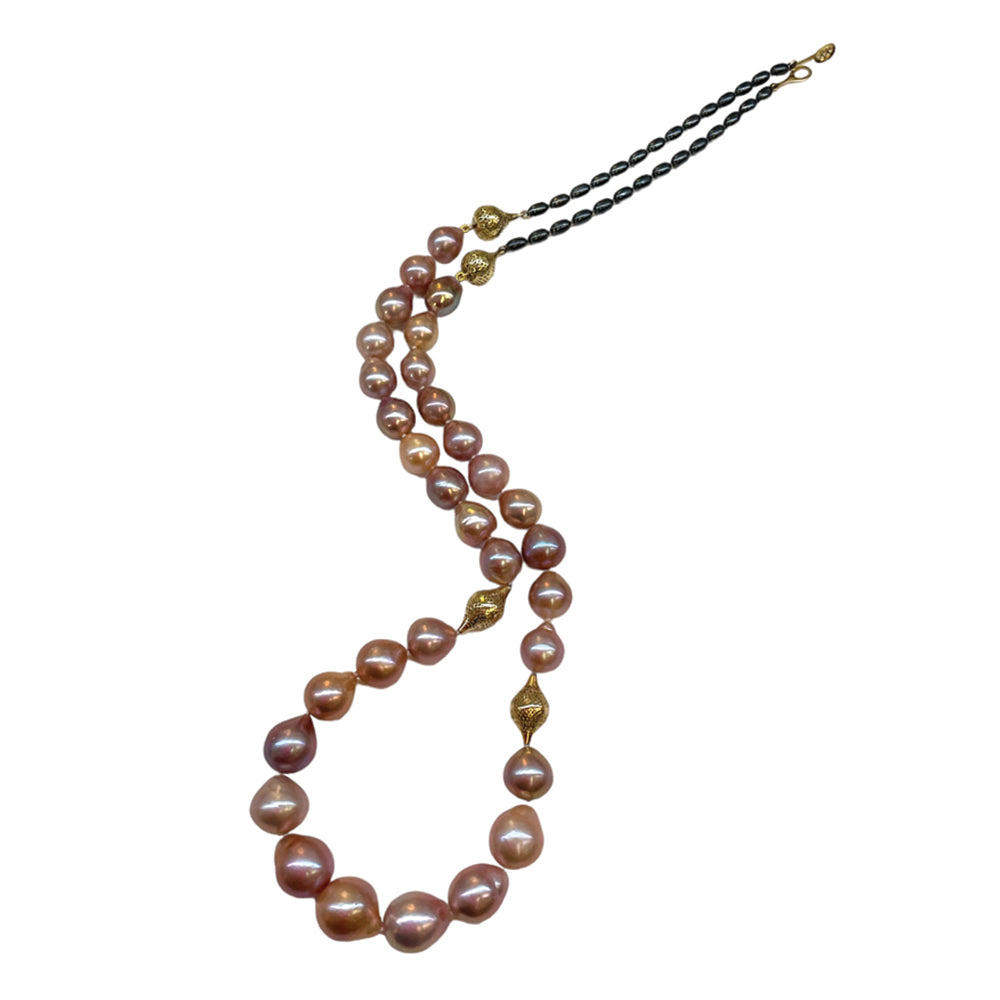 Natural multicolored baroque fresh water pearls, 10-15mm diameter, with two small 18k yellow gold crownwork finials and two amphoras on oxidized silver chain with a lilypad clasp. Necklace is 29.5" long.