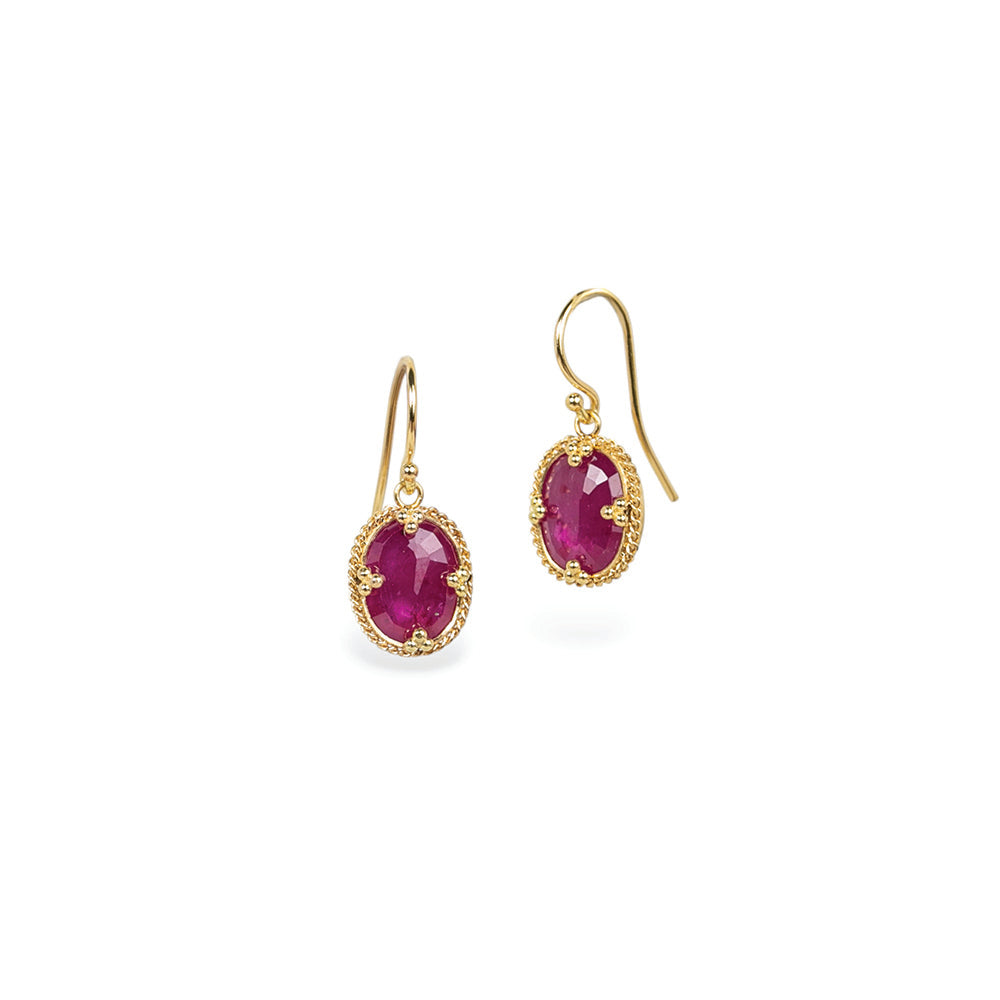 One-of-a-kind earrings with an oval ruby, 5.09 cts. Earrings are 10 x 12mm and 21mm total length with 18k gold French wires.
