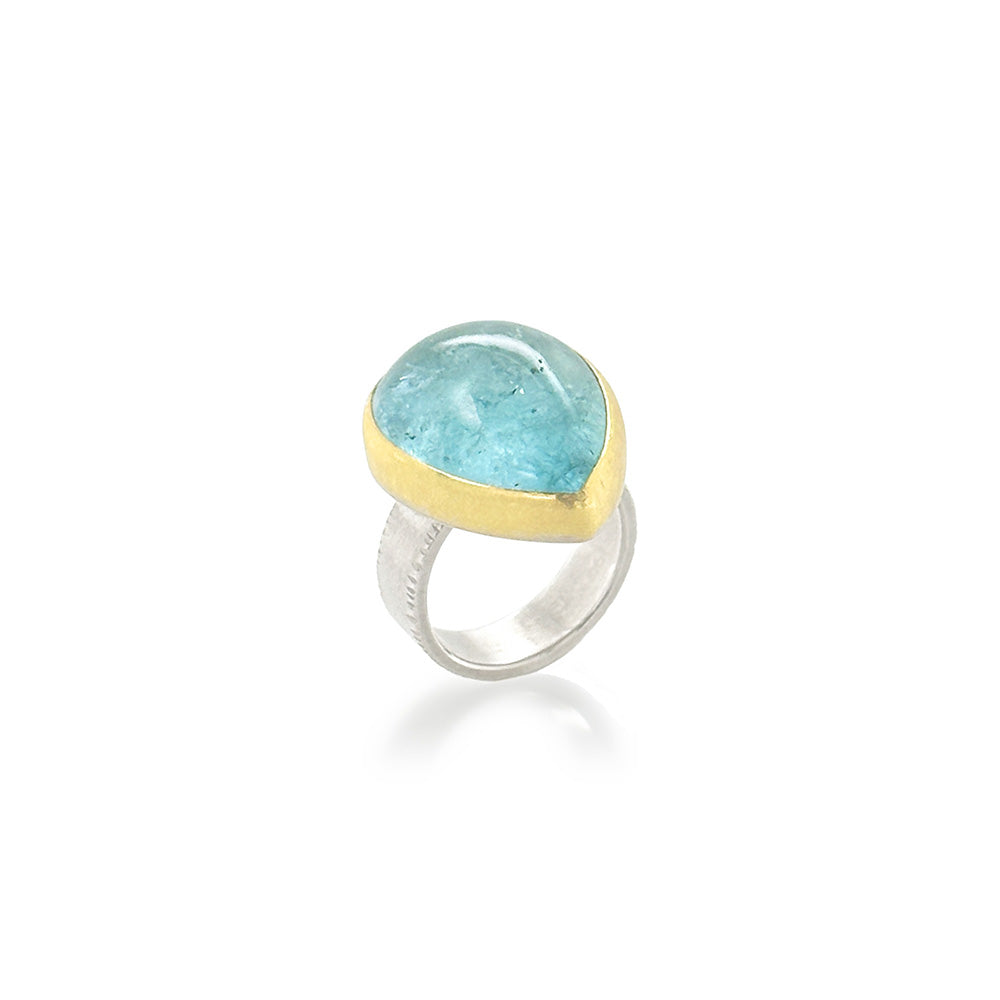 Tear-drop shaped cabochon aquamarine set in 22k yellow gold and a sterling silver ring shank. Aquamarine is 23 x 19mm and is a size 7.