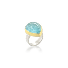 Tear-drop shaped cabochon aquamarine set in 22k yellow gold and a sterling silver ring shank. Aquamarine is 23 x 19mm and is a size 7.