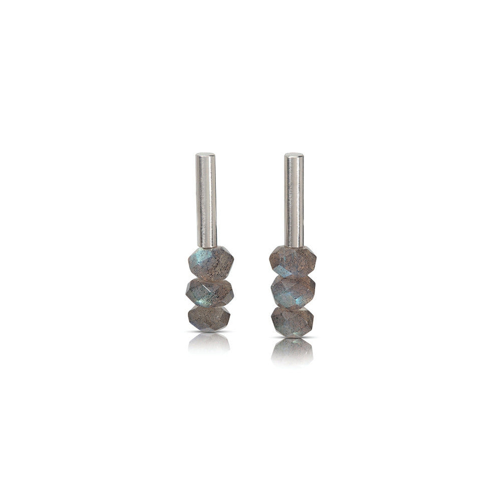 Sterling silver vertical tube earrings with post backs and faceted labradorite beads with a 24k yellow gold rivet at the base.